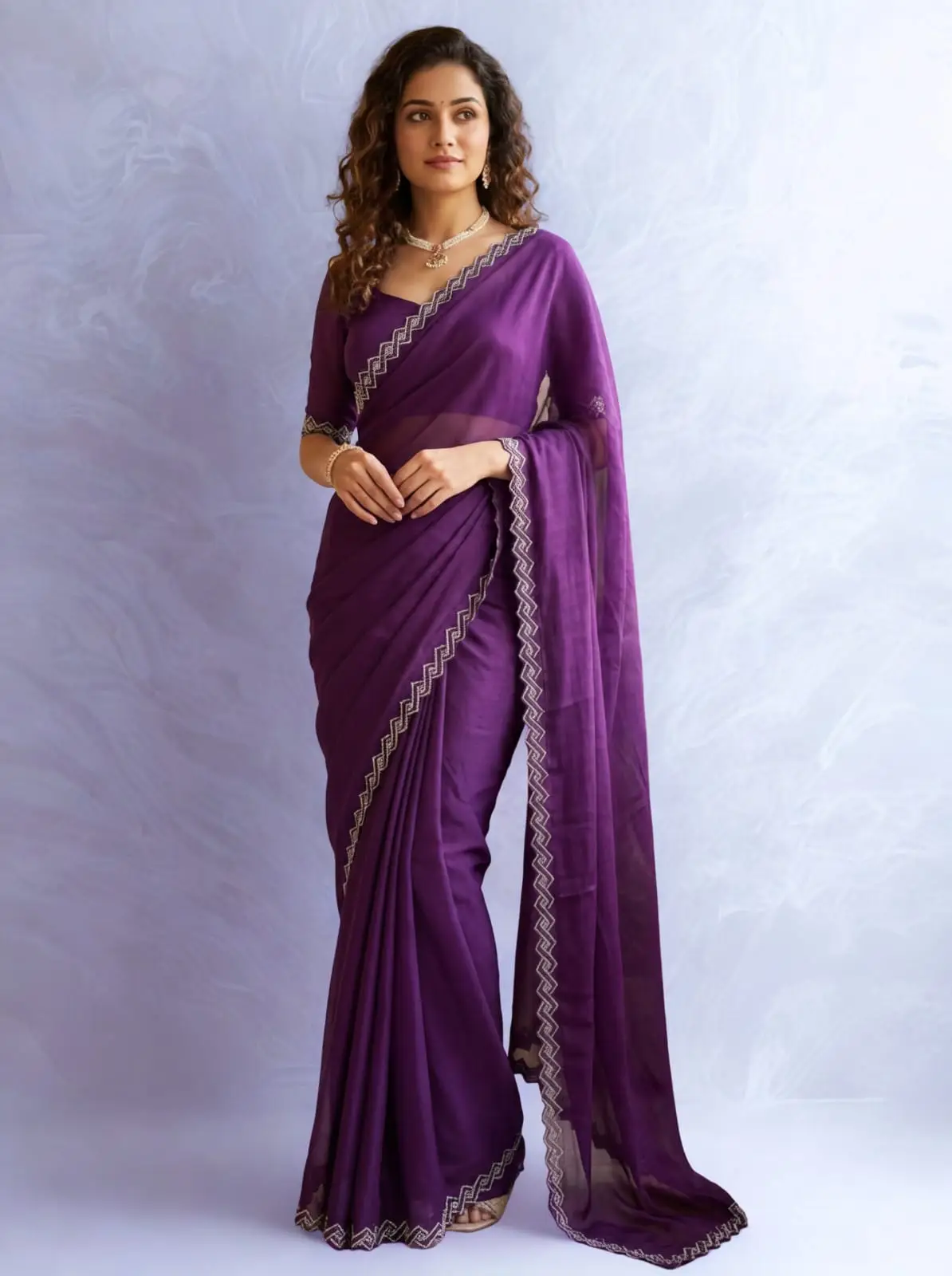 Royal Plum Chiffon Saree with Intricate Zari Zig-Zag Border